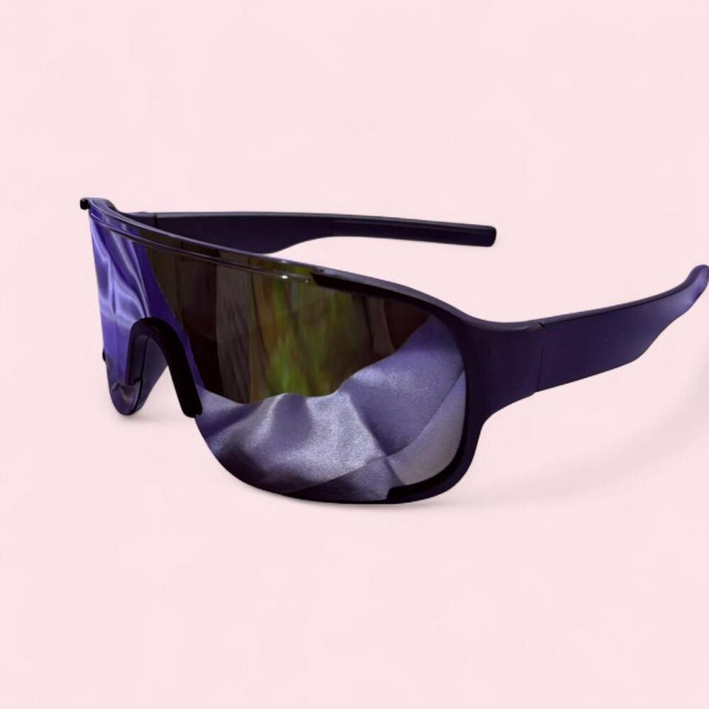 Unisex Black mirrored shield sunglasses with a sleek futuristic wraparound fit